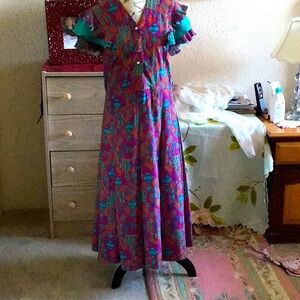 Colourful summer dress with frilly sleeves.